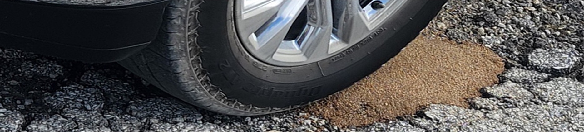 CE 9-1-1 Header Image of car tire driving over FasTrac CE 9-1-1 patch